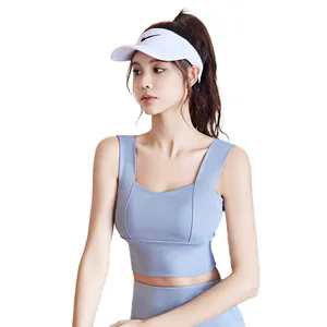 Soutien-gorge de sport de yoga sans couture et antichoc avec de larges bretelles sur modèle