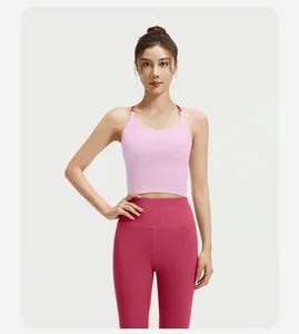 Detailweergave van de schokbestendige roze en magenta kleurblok yoga fitness set
