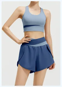 Detail view of blue yoga set with sports bra and crossover waist running shorts