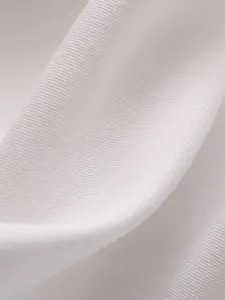 Detailansicht des hochelastischen Yoga-Stoffs aus 82,5 % Polyester und 17,5 % Elasthan