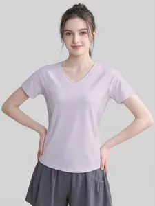 Camiseta de fitness para mujer con cuello en V color lila y espalda de malla para yoga