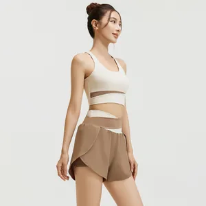 Premium two-piece sports bra and shorts yoga set for fitness and running workouts.