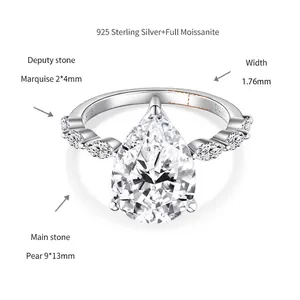 Technical detail of a pear-cut moissanite ring with marquise side stones in 925 silver.