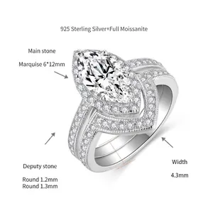 Marquise cut moissanite ring set in 925 sterling silver with vintage milgrain detailing.