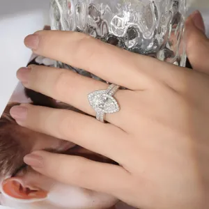 Close-up of a vintage marquise-cut 2ct S925 silver ring on a finger