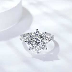 Detailed close-up of a sparkling sunflower moissanite wedding ring in 925 sterling silver