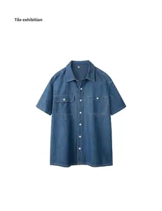 Professional flat lay view of a classic blue short-sleeve cotton denim shirt for men
