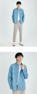 Young male model posing in light blue long sleeve double pocket casual shirt jacket
