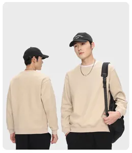 Front and back views of a minimalist men's beige crewneck sweatshirt in a studio