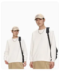 Detail of men's minimalist white round neck sweatshirt with casual styling on model