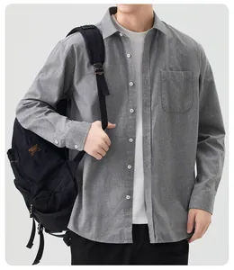 Detailed view of grey brushed cotton long-sleeved casual shirt for men featuring a pocket