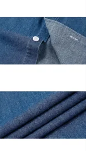 Close-up of premium cotton denim shirt fabric showing fine stitching and texture