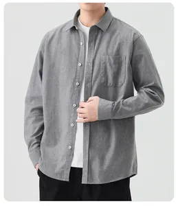 Close-up of a casual gray cotton long-sleeve shirt for men with a front chest pocket
