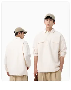 Detailed view of men's cream waffle textured half-placket shirt with a loose casual fit