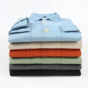 Stack of men's casual cotton shirt jackets in multiple colors featuring double pockets