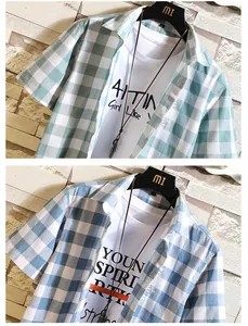 Detailed macro view showing the fabric texture and patterns of green and blue plaid shirts