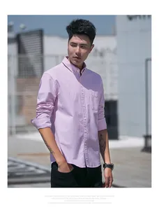 Detailed view of men's pink striped long-sleeved Oxford shirt on an Asian model.