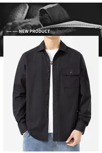 Premium men's solid black long-sleeved cotton shirt featuring a functional chest pocket detail