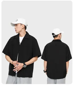 Detailed front and back view of a men's loose fit black Cuban collar short sleeve shirt