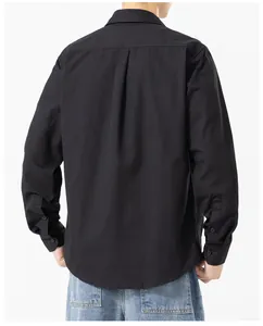 Back view of a classic black long-sleeved cotton shirt for men with a relaxed fit.