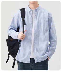 Detailed view of men's blue and white striped cotton oxford shirt for casual daily styling