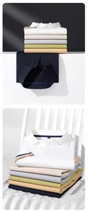 Detailed view of high-elasticity men's polo shirts in multiple colors stacked neatly