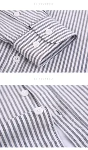 High-quality macro detail showing striped Oxford shirt cuff texture and white resin buttons