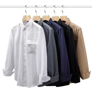 Men's multi-color cotton long-sleeve shirts with pocket hanging on wooden hangers