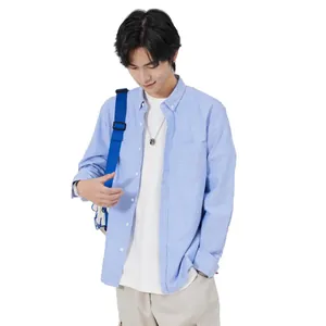 Chemise décontractée en coton Oxford bleu clair pour homme à manches longues et poche
