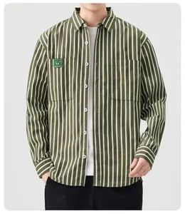 Front view detail of men's green and white vertical striped casual long sleeve shirt