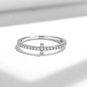 Close-up of S925 sterling silver horizontal cross ring with sparkling moissanite