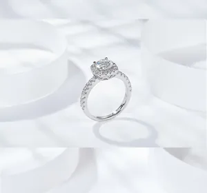 Detailed view of a brilliant 3-carat moissanite ring in halo setting with stones
