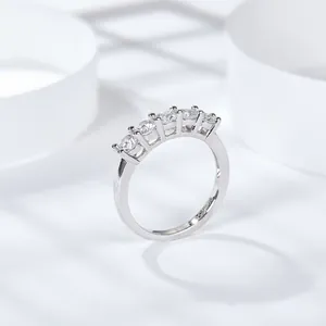 Elegant 925 silver ring featuring five brilliant D color moissanite stones in a row.