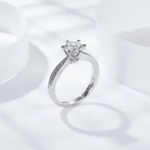Elegant 925 silver Moissanite ring with six-prong crown setting and side diamonds