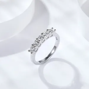Elegant 925 sterling silver row ring featuring five sparkling round Moissanite stones
