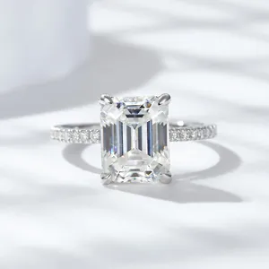 Stunning macro detail of a four-carat emerald cut moissanite ring in 925 sterling silver