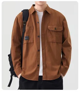 Men's casual brown long-sleeve shirt with double chest pockets and brand patch