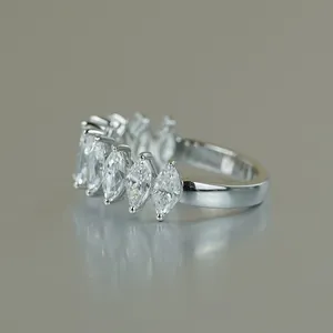 Close-up of a marquise-cut Moissanite row ring in 18k white gold plated silver
