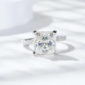 Elegant 5 carat princess cut moissanite silver ring with side stones on white background