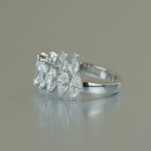 Marquise cut moissanite half eternity ring in silver plated 18k gold finish