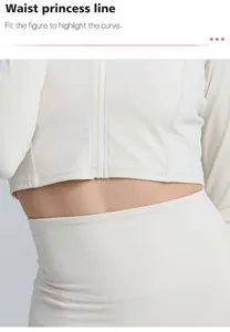 Dettaglio di una giacca yoga slim fit che mostra la linea principessa in vita e la zip.