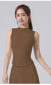 Detail of slim-fit brown sleeveless yoga top featuring a sleek athletic crew neckline