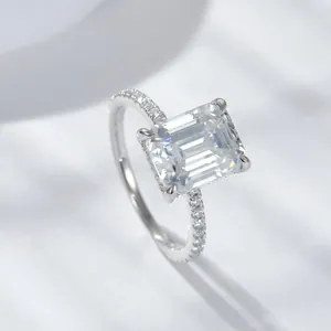 Elegant 4 carat emerald-cut moissanite engagement ring in 925 sterling silver