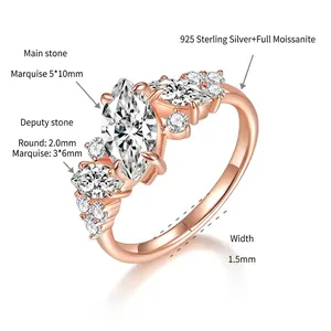 Detailed macro shot of an asymmetric marquise-cut moissanite ring in 18k rose gold plating