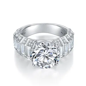 Detail shot of a luxury 5-carat round moissanite ring featuring baguette side stones