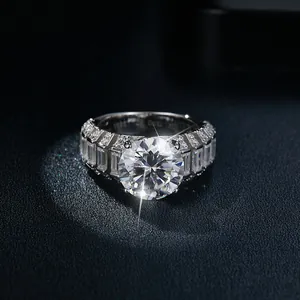 Macro detail of a luxury 5-carat round moissanite ring with baguette side stones
