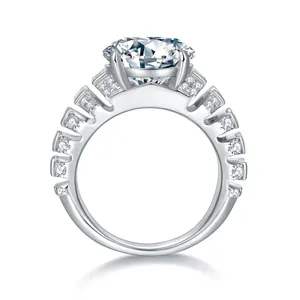 Luxury 5-carat round moissanite ring with baguette side diamonds on white background