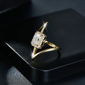 Detailed view of the 2 carat radiant cut moissanite stone on an asymmetrical gold ring
