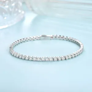 Close-up detail of S925 silver horseshoe bracelet with 1.8mm round moissanite bubble links