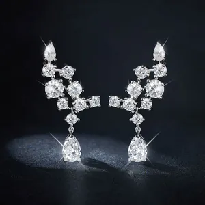 Luxury 925 sterling silver cluster earrings with 5x8mm pear-cut moissanite stones